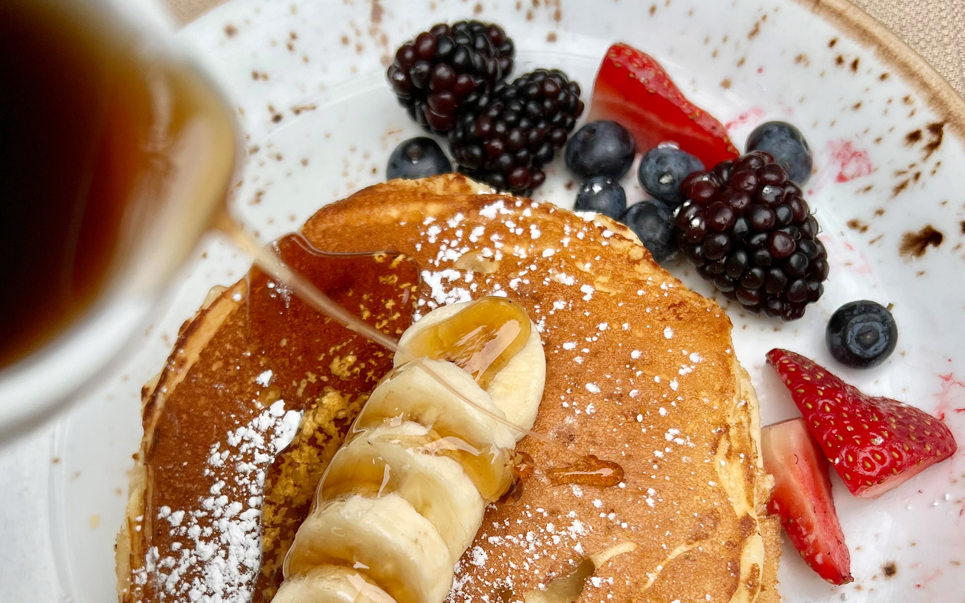 plate of pancakes and fruit
