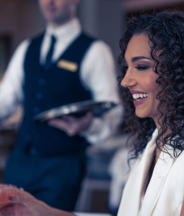 woman dining at Salamander DC lounge