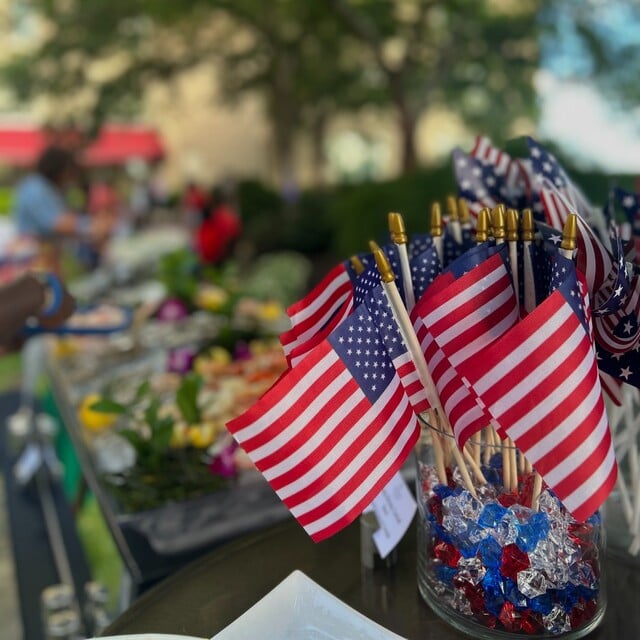 American flags in a cup