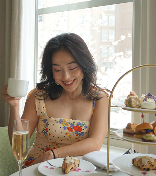woman enjoys afternoon tea