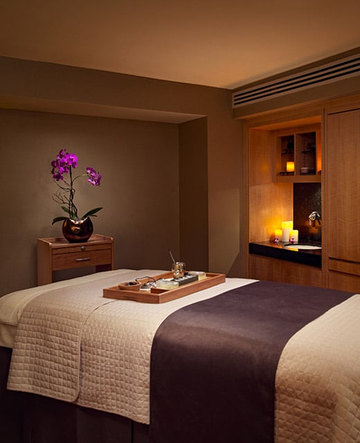 A massage table in a spa room