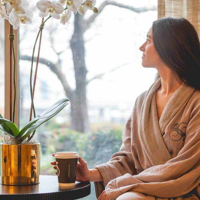 woman starring out window